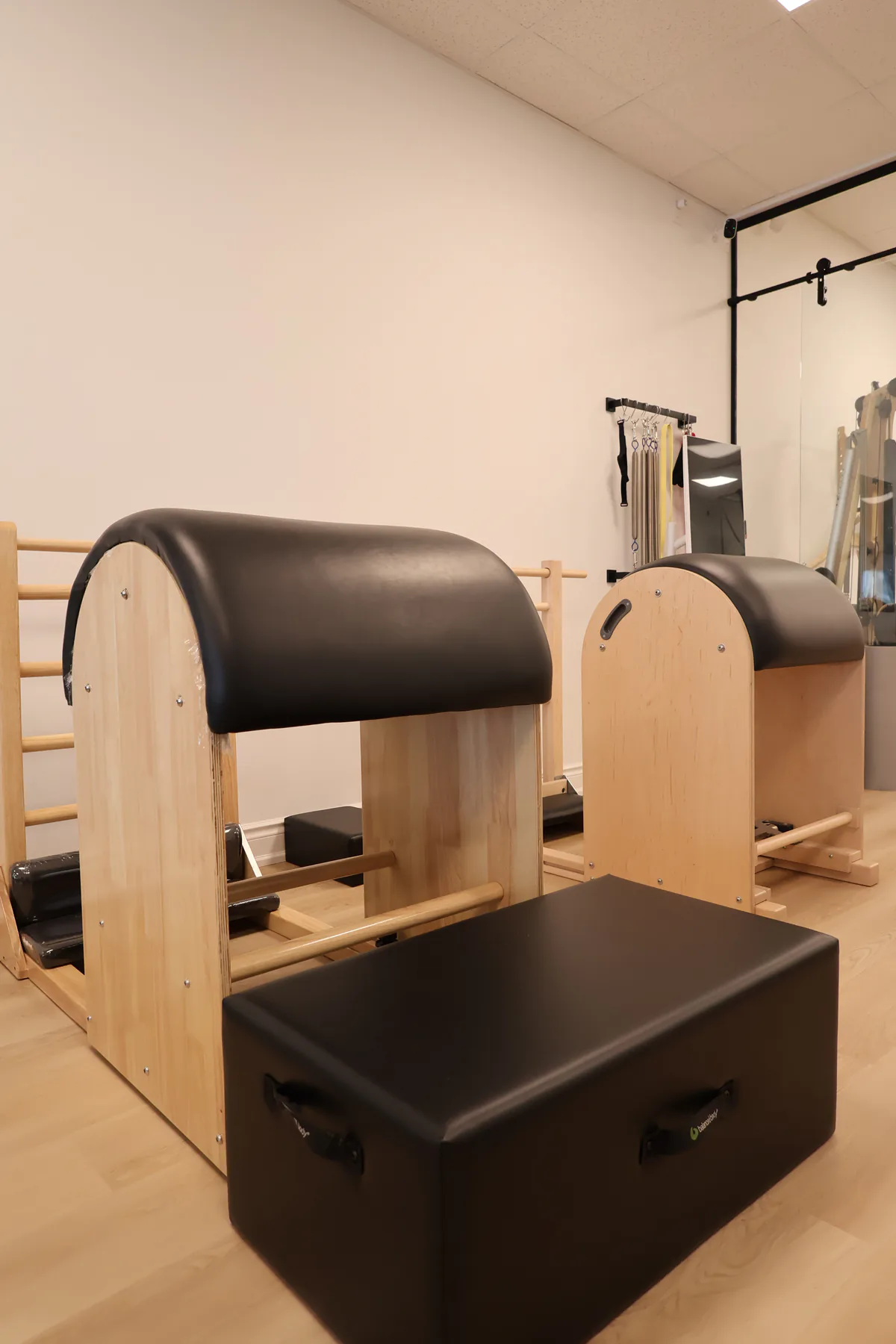 Pilates ladder barrel used for spinal extension and stretching.