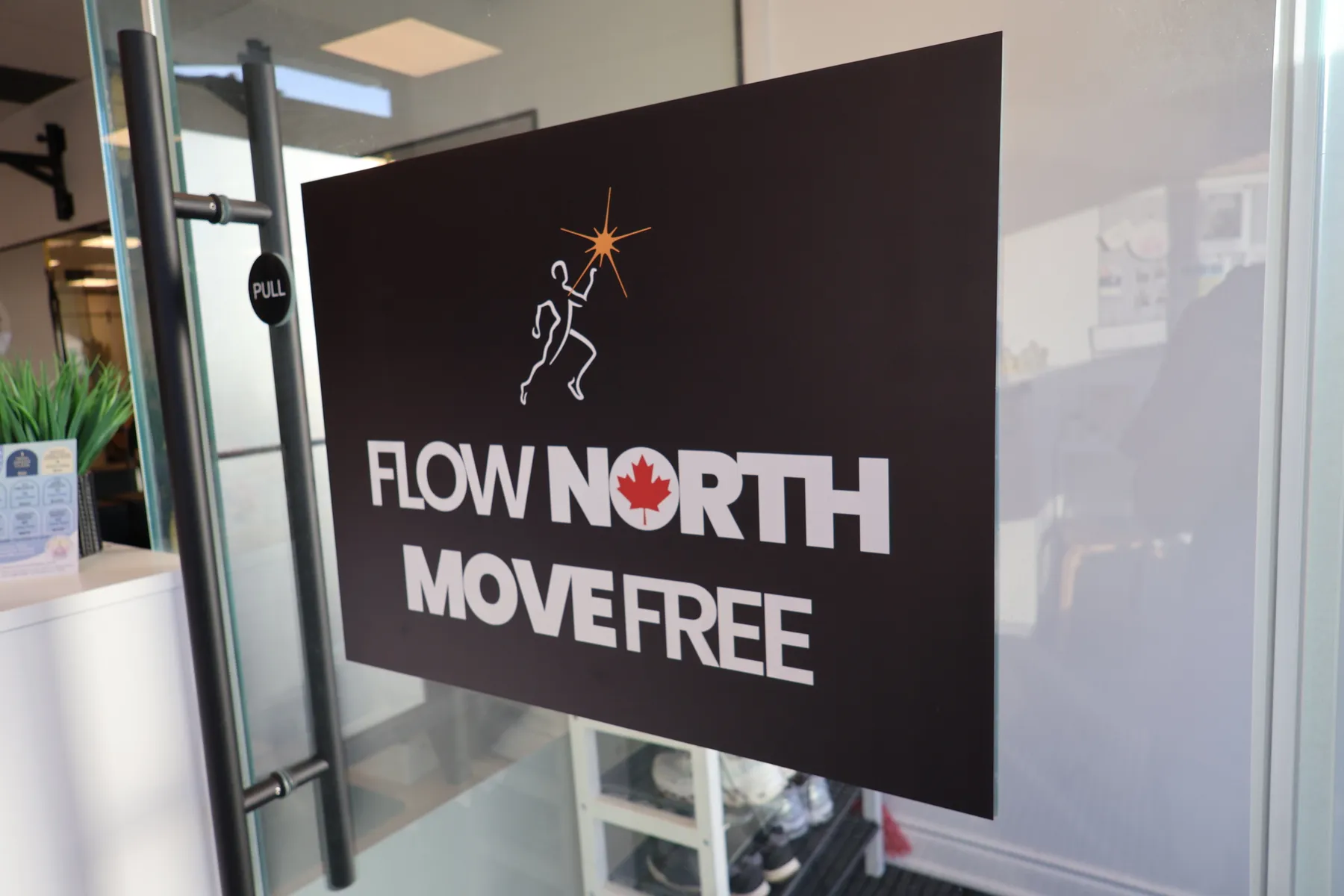 Front entrance of Motion Vitality Pilates featuring the Polestar Pilates branding.